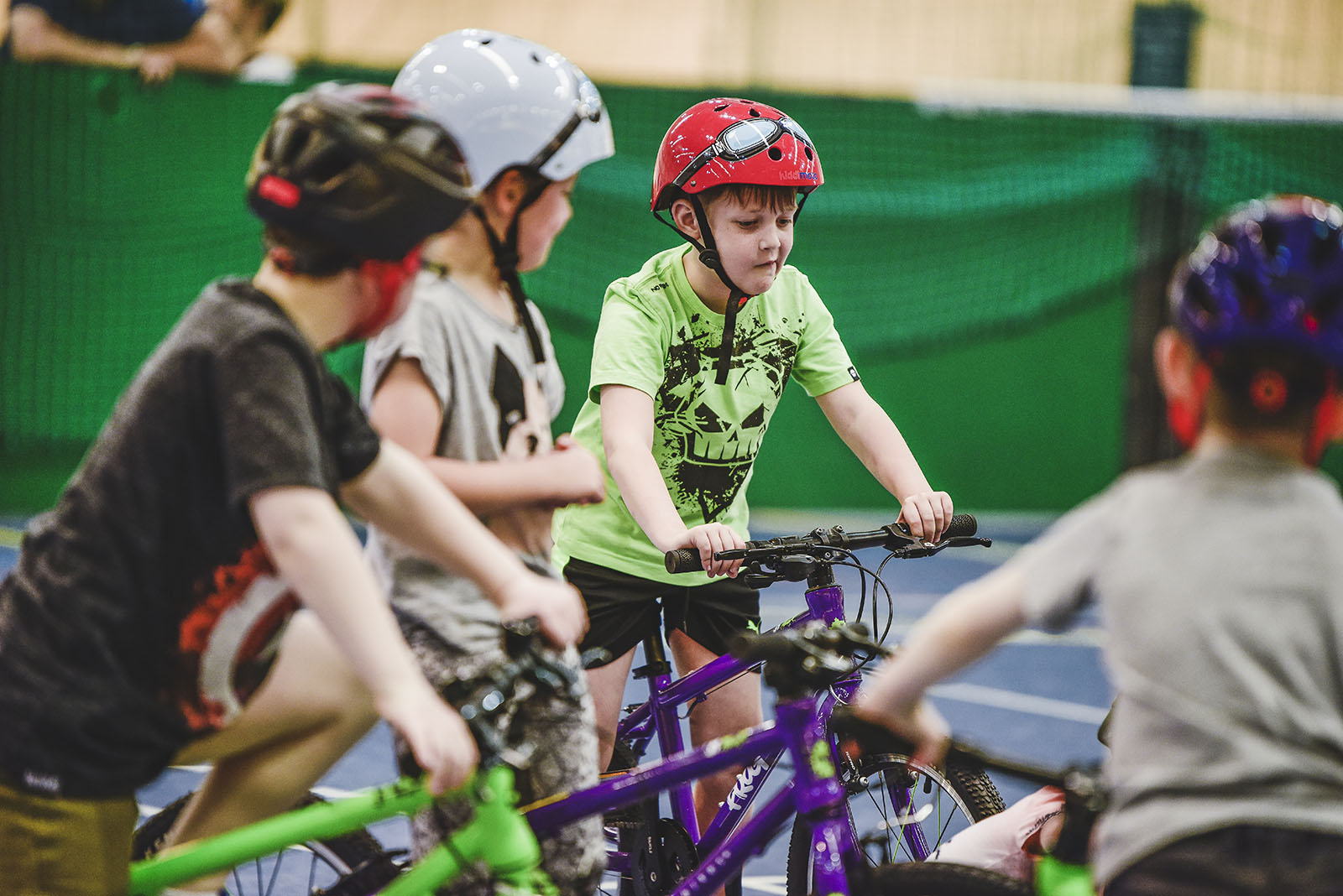 Three young boys on bikes