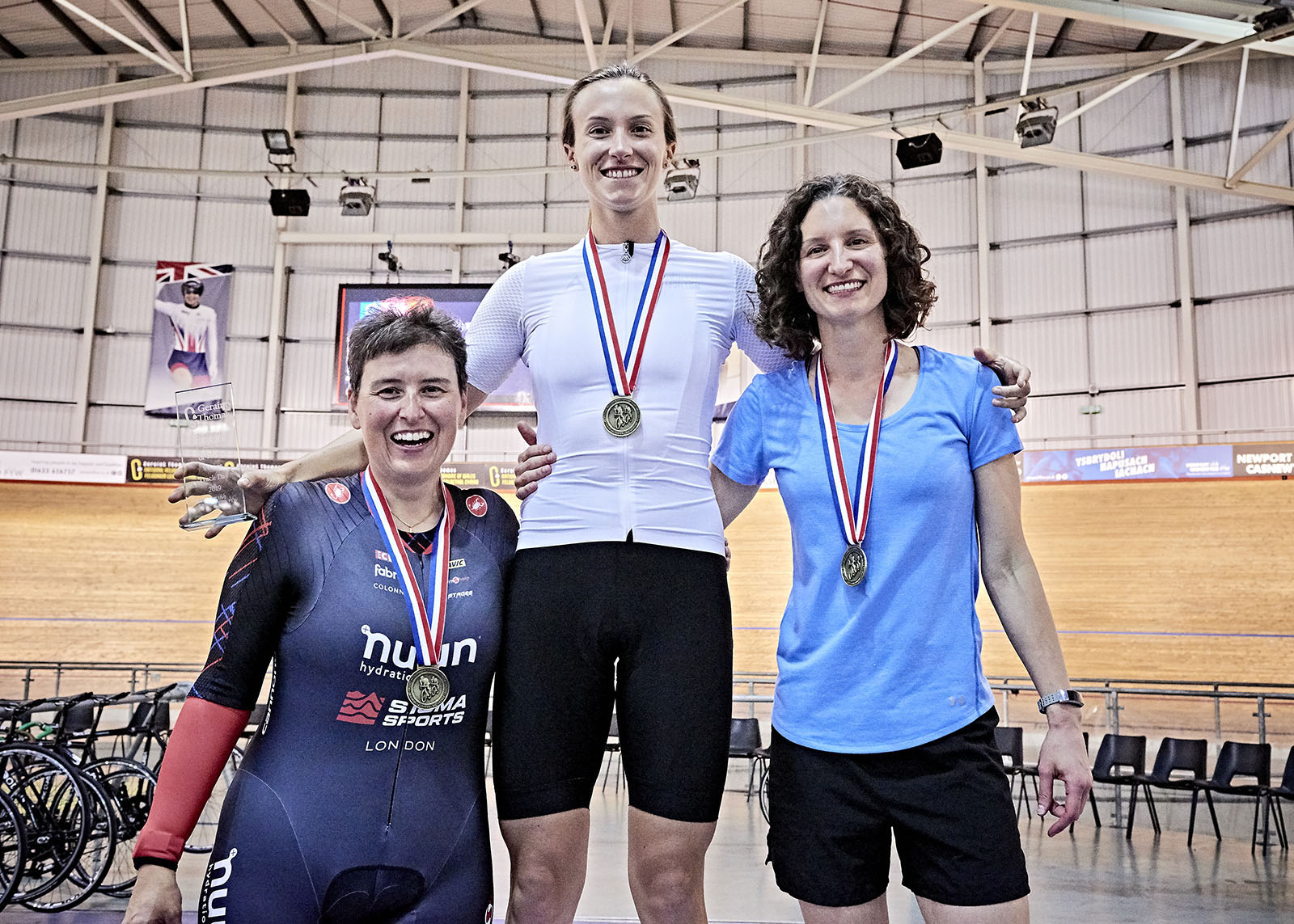 Group of three wearing medals