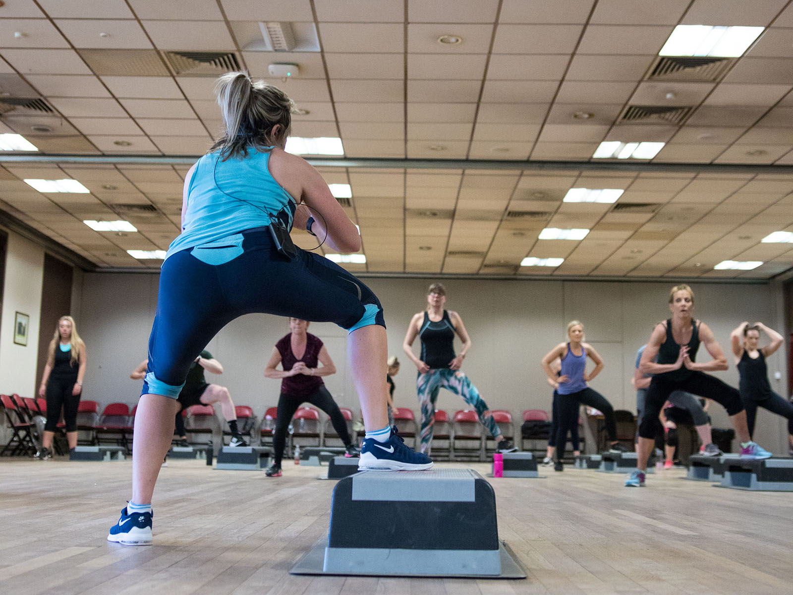 aerobics instructor teaching a class